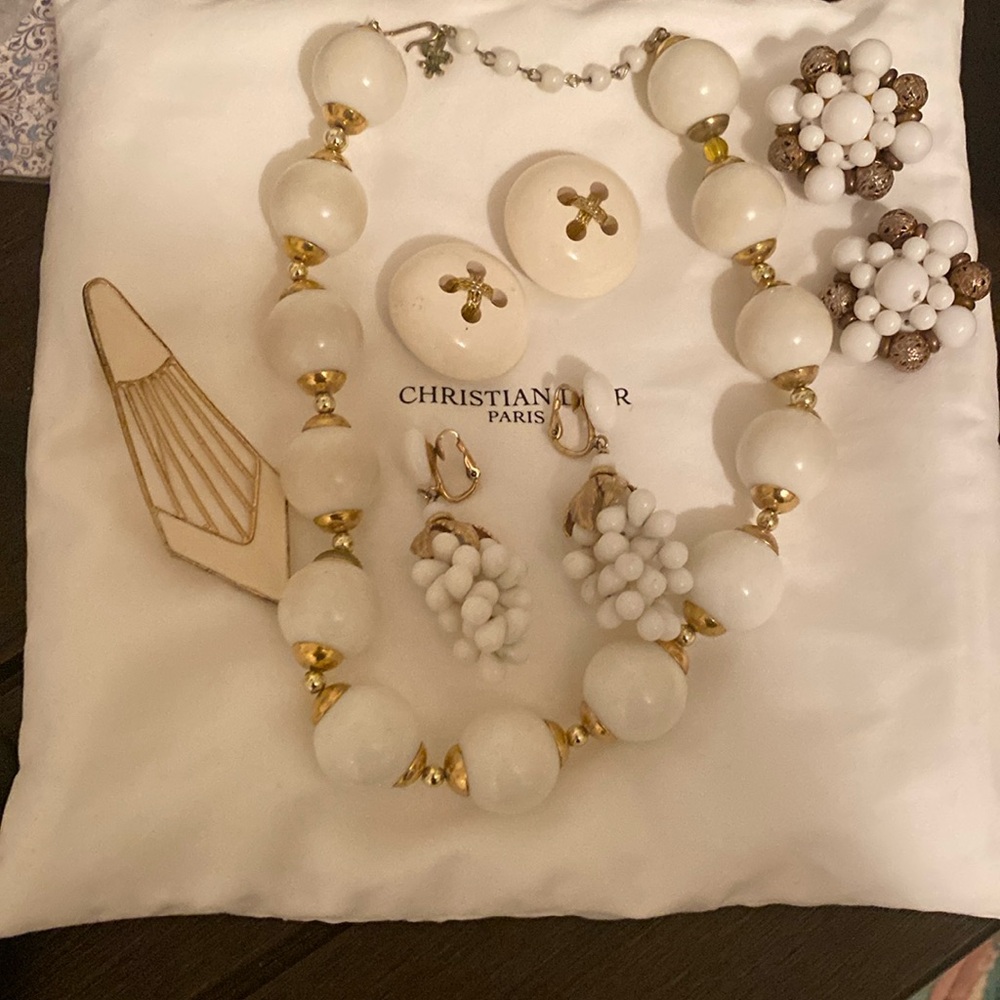 Three earrings, necklace and a broach
